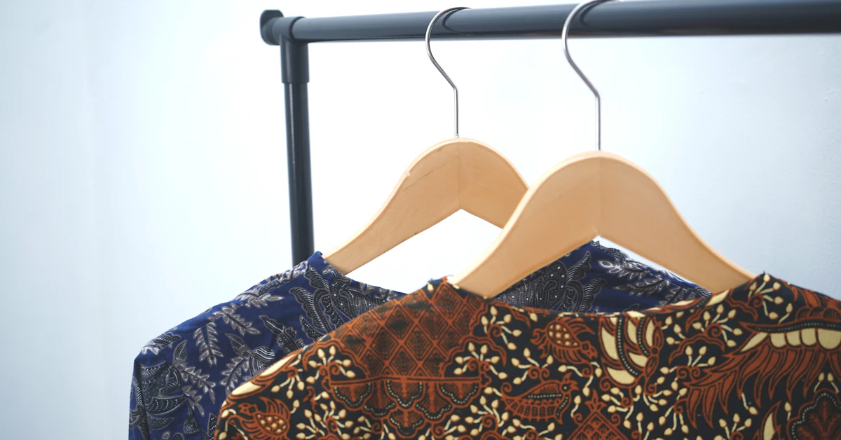 a woman's dress with a black and gold pattern